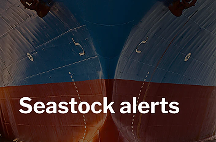 Close-up of a ship's bulbous bow with the title Seastock alerts.