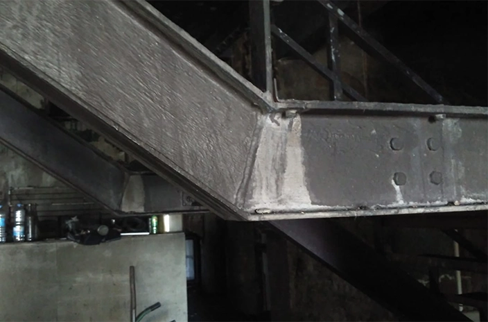 Beam coated with Hempel's intumescent coating.