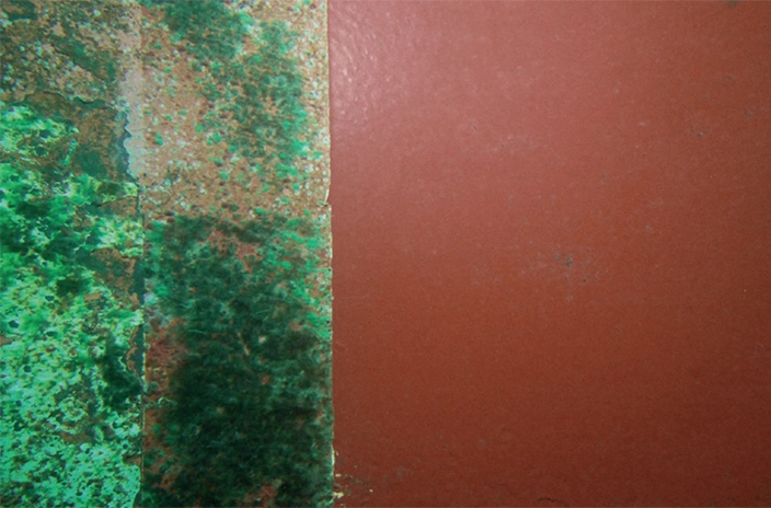 A close-up underwater view shows a clean Hempaguard patch next to a fouled section on the ship's hull after 45 months.