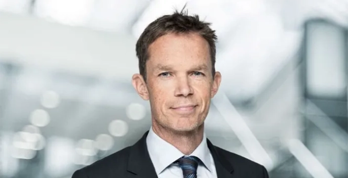 Peter la Cour Gormsen, Chief Financial Officer and Executive Vice President of Finance at Hempel in a suit.