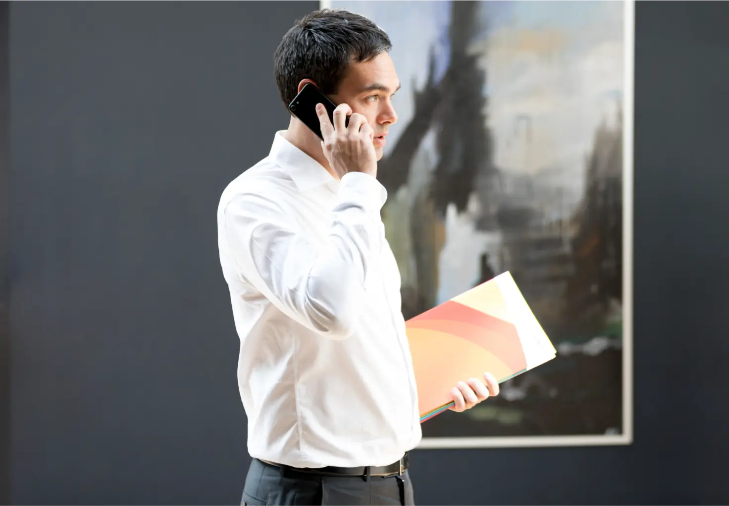 Man in the office having a phone call