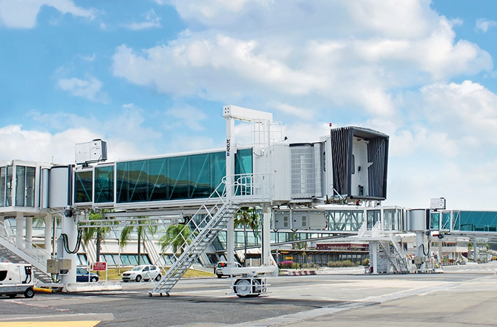 Idle airport boarding bridge from Adelte, disconnected from aircraft.